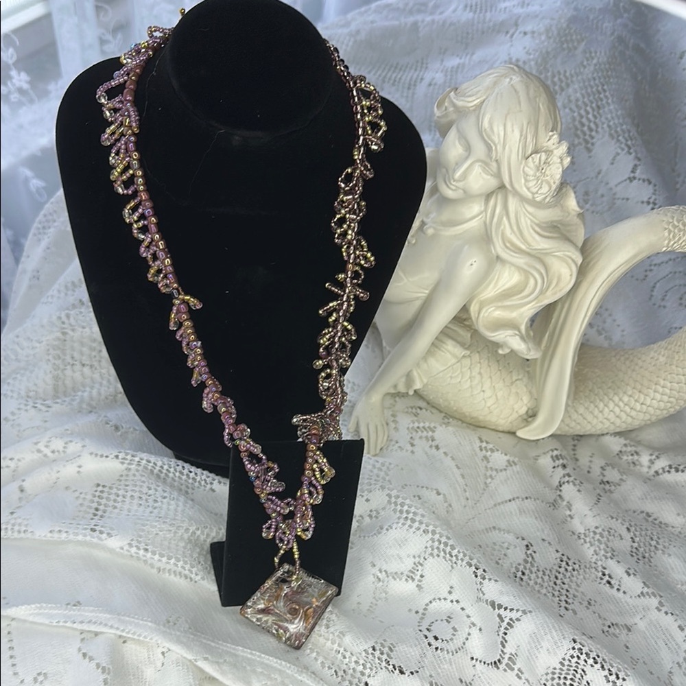 Elegant Gold and Purple Necklace